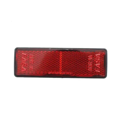 Catadiottrico rettangolare 90x32 mm rosso posteriore.