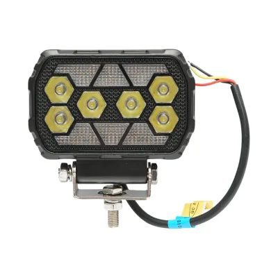 Proiettore LED rettangolare con DRL 9-36V, 28W bianco-giallo, corpo in alluminio 112x75x45mm IP68 Breckner Germany
