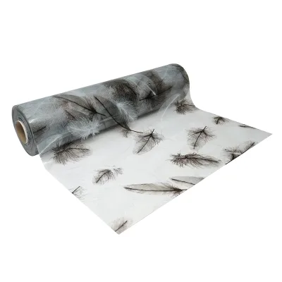 Rotolo di pellicola protettiva per tavoli in PVC siliconico trasparente 0,8x20m, spessore 1,2mm, , modello piume Breckner Germany - immagine 6